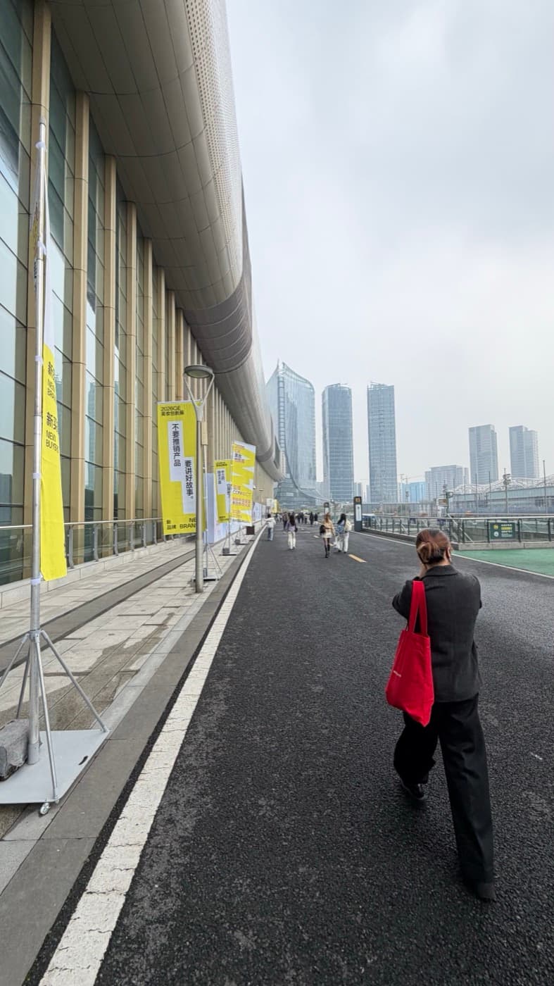 The approach to the Hangzhou International Expo Center with CiE 2026 banners along the road.